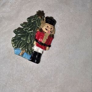 Festive Nutcracker Ornament with Christmas Tree